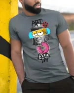 Intriguing Mixed Media Art Pink Sprinkle Donut Tshirt - model wearing grey tee, leaning on column