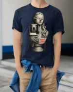 Thoughtful Blindfolded Statue Bust Photo Collage Graphic Tee - model wearing navy tee with hands in pockets