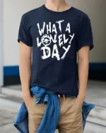 Dystopian Wasteland Flaming Skull Symbol Graphic Tee - model wearing navy tee with hands in pockets