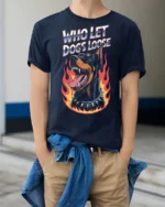 Fierce Who Let Dogs Loose Doberman Flame Graphic Tee - model wearing navy tee with hands in pockets