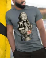 Thoughtful Blindfolded Statue Bust Photo Collage Graphic Tee - model wearing grey tee, leaning on column