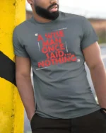 Sarcastic A Wise Man Once Said Nothing Distressed Tshirt - model wearing grey tee, leaning on column