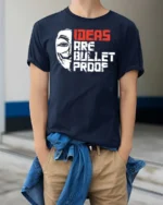Thought Provoking Ideas Are Bullet Proof Anonymous Tshirt - model wearing navy tee with hands in pockets