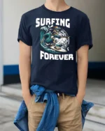 Adventurous Surfing Forever Skeleton Wave Rider Graphic Tee - model wearing navy tee with hands in pockets