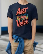 Vibrant Retro Sunset Art Is My Voice Typography Tshirt - model wearing navy tee with hands in pockets