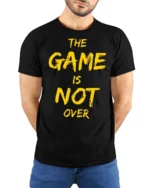 Ultimate The Game Is Not Over Yellow Typography Tshirt - model wearing black tee with hands behind back