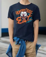 Aggressive Hungry Dogs Eat White Pitbull Splatter Graphic Tee - model wearing navy tee with hands in pockets