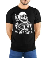 Sarcastic Shhh No One Cares Silent Skull Graphic Tshirt - model wearing black tee with hands behind back