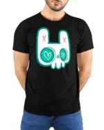 Charming Pastel Goth Bunny Skull Heart Eyes Graphic Tee - model wearing black tee with hands behind back