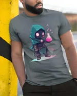 Enchanting Miniature Alchemist Hooded Rogue Magic Graphic Tee - model wearing grey tee, leaning on column