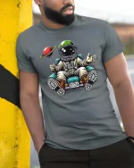 Charming Astronaut Sitting On Car Planet Balloon Tshirt - model wearing grey tee, leaning on column